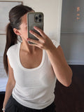 della white u neck top
