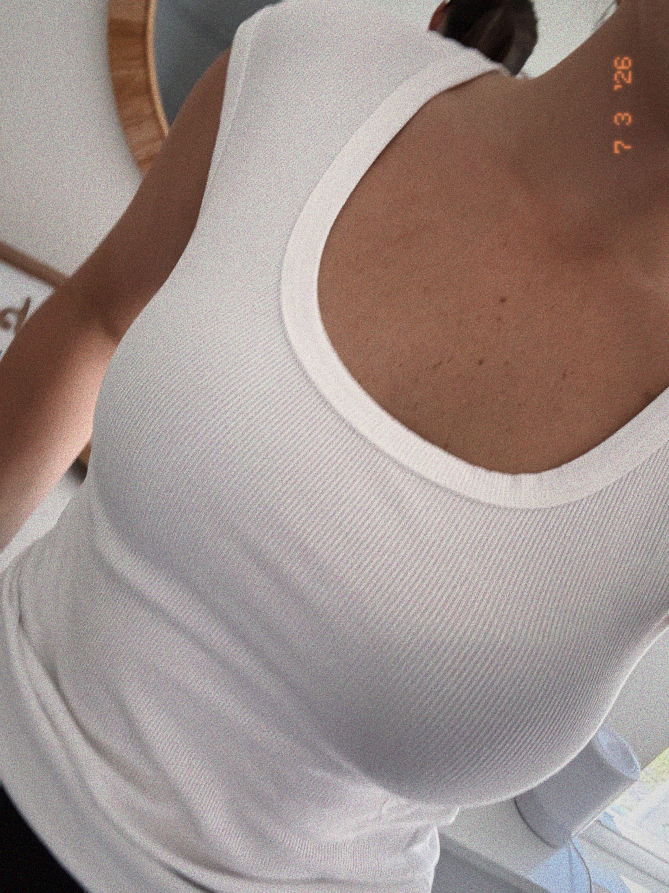 della white u neck top